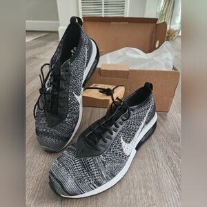 New in a box Nike Air Max Flyknit Racer sneakers in black and white